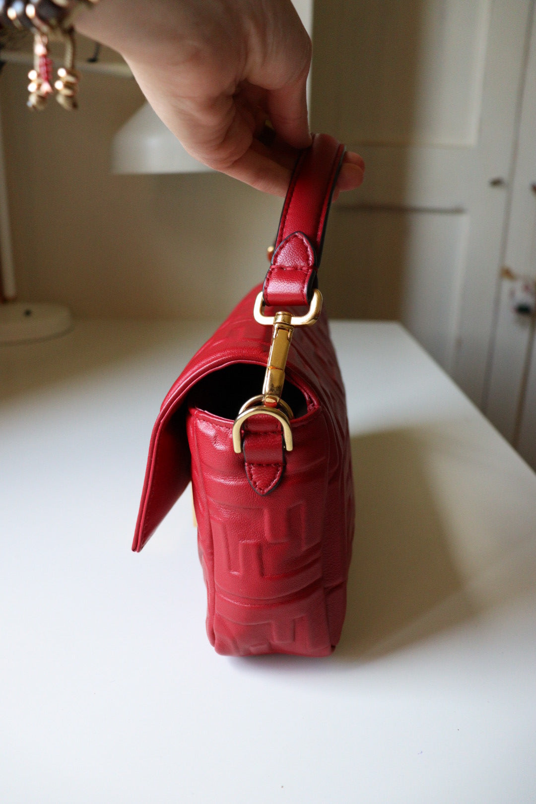 Fendi Baguette FF Embossed color rosso scuro