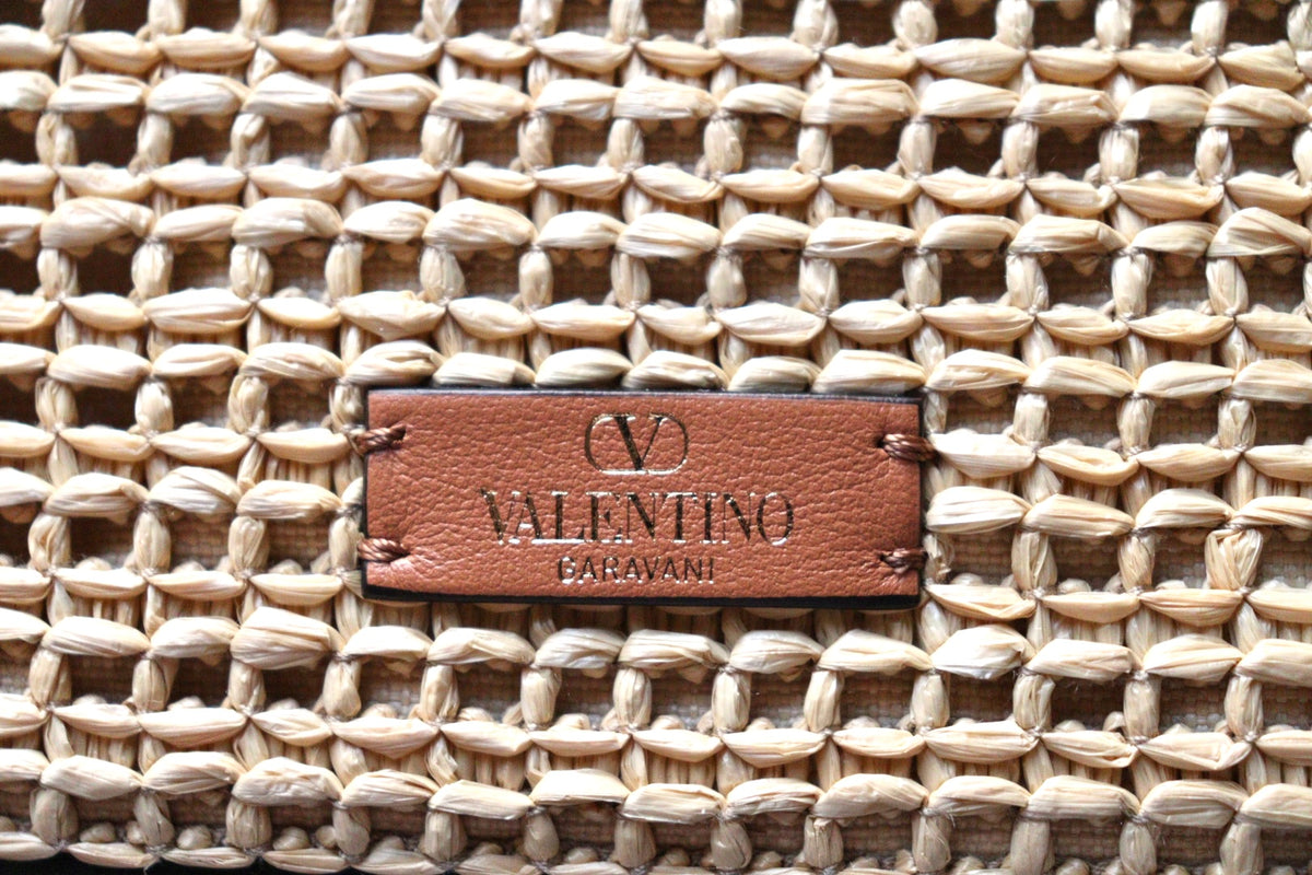 Secchiello rockstud in rafia intrecciata Valentino Garavani