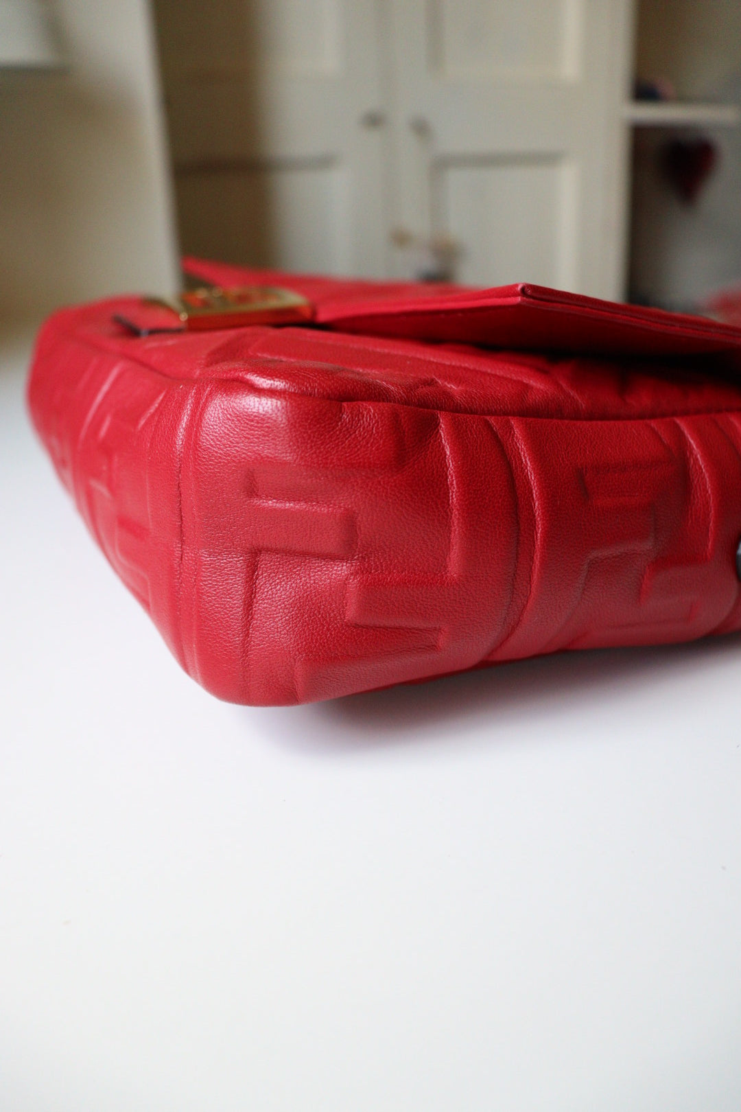 Fendi Baguette FF Embossed color rosso scuro