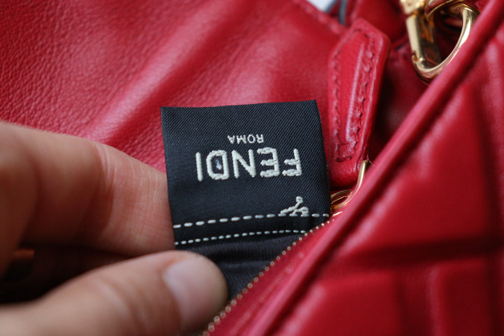 Fendi Baguette FF Embossed color rosso scuro