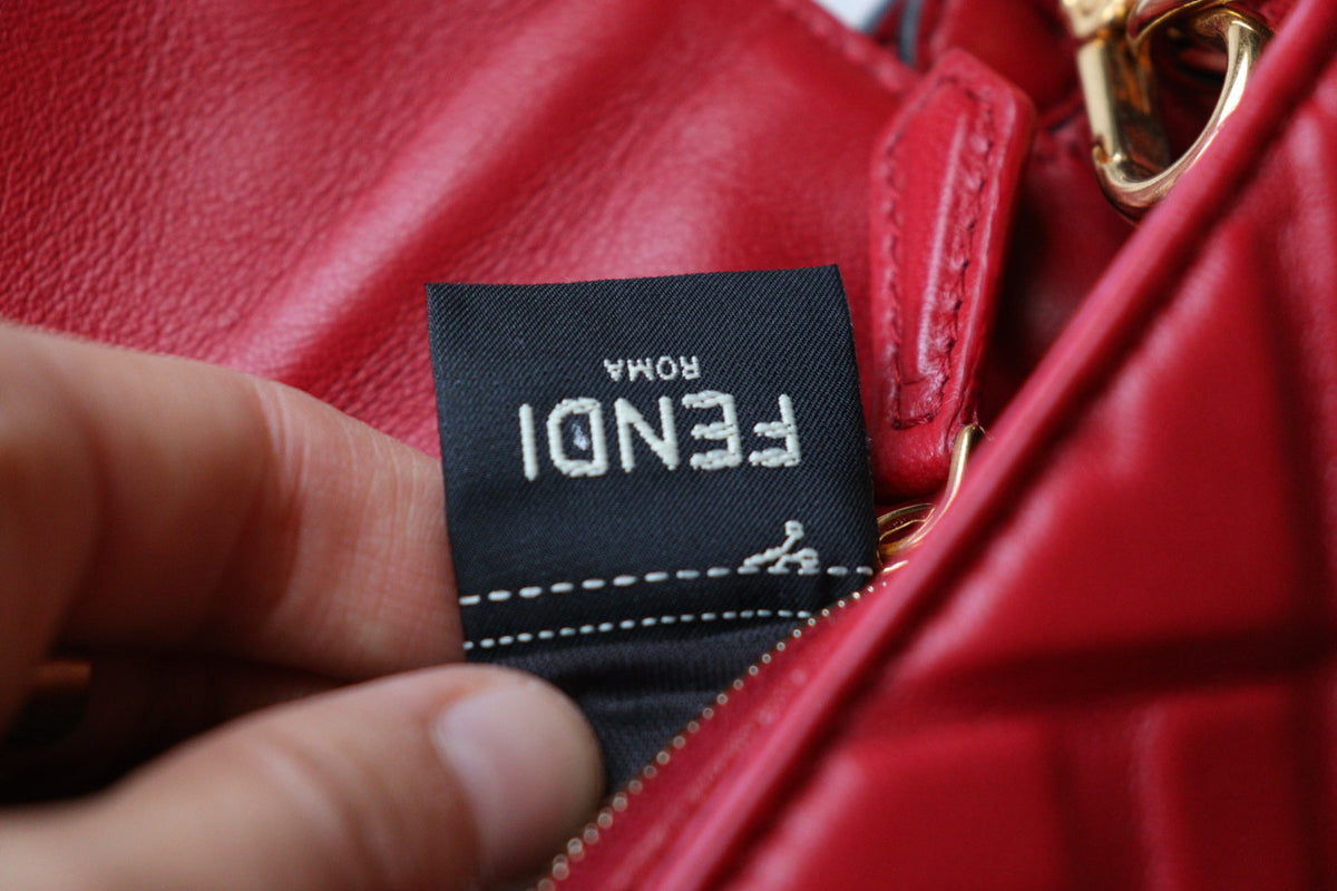 Fendi Baguette FF Embossed color rosso scuro